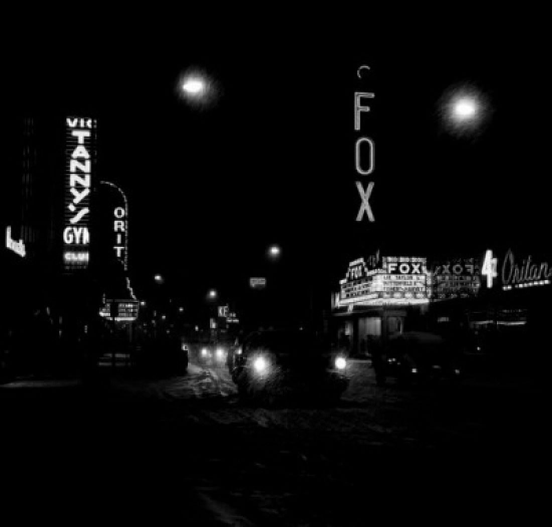Illuminated cinema in city at night Canvas Art - (24 x 36)