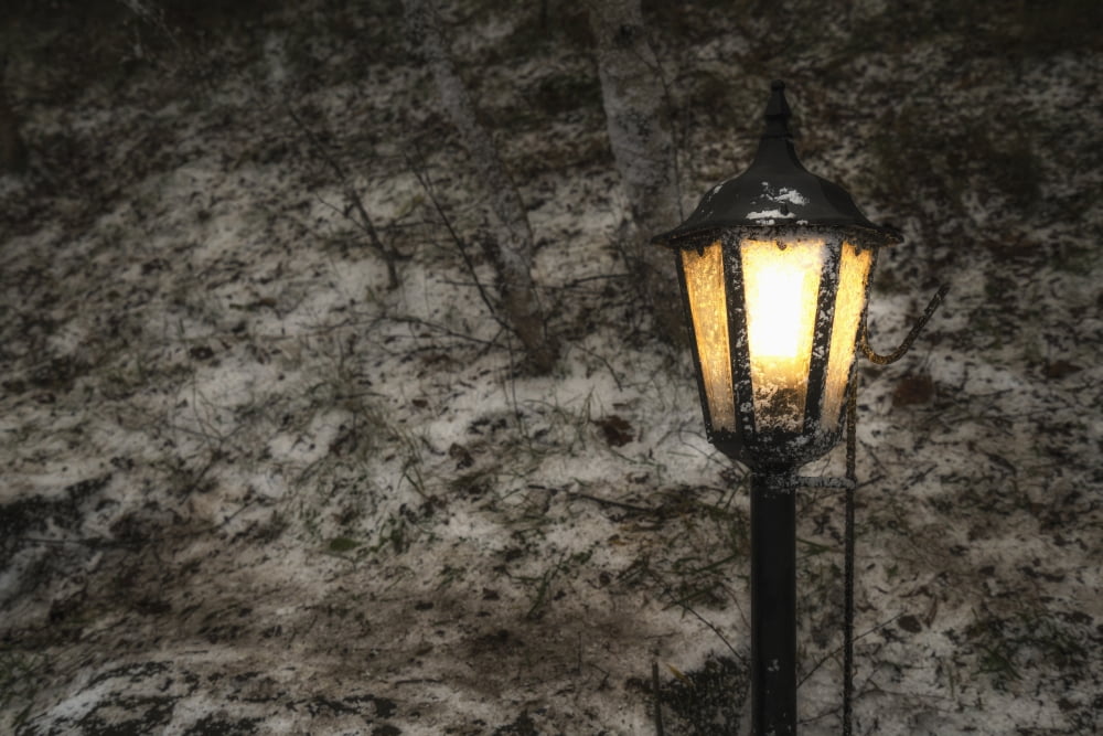 Illuminated lamp post against a stone wall Beamish England Canvas Art - John Short Design Pics (19 x 12)