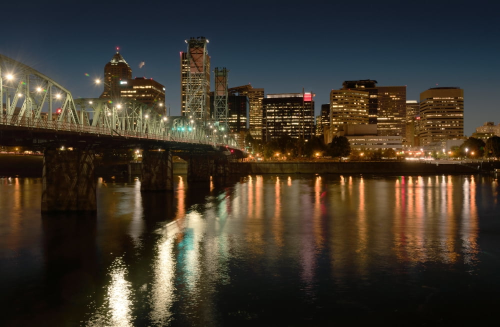 Illuminated skylines at the waterfront Portland Multnomah County Oregon USA Canvas Art - Panoramic Images (18 x 24)