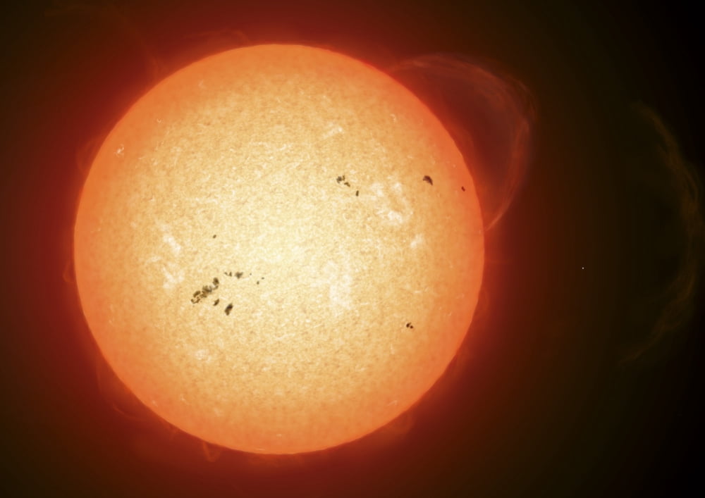 Illustration of the sun with visible dark sunspots on the surface prominences and some solar wind Canvas Art - Fahad SulehriaStocktrek Images (34 x 24)