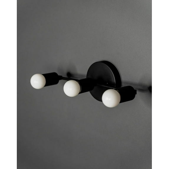 In stock - Ships on the same day! Brontes 3 Light Mid Century Modern Bathroom Hallway Vanity Sconce