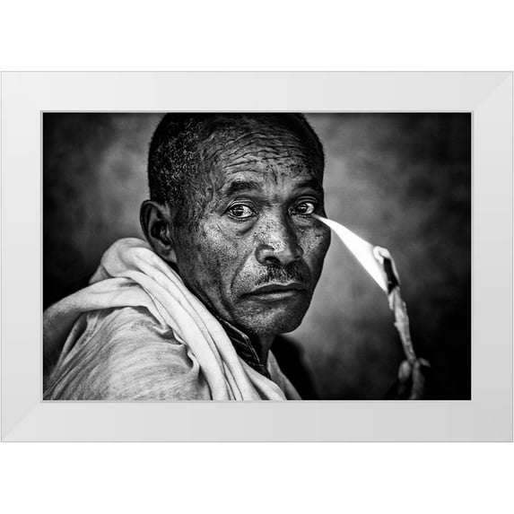 Inazio Kuesta, Joxe 14x11 White Modern Wood Framed Museum Art Print Titled - Ethiopian Man Holding A Lit Candle In A Religious Ceremony.