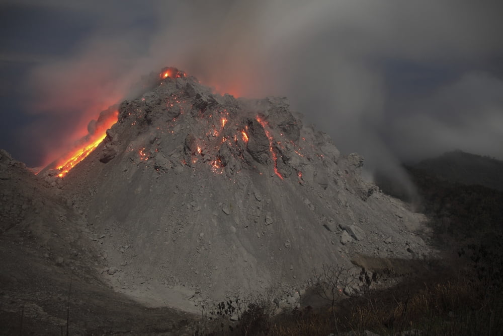 Incandescent rockfall at Rerombola lava dome of Paluweh volcano Canvas Art - Richard RoscoeStocktrek Images (18 x 12)
