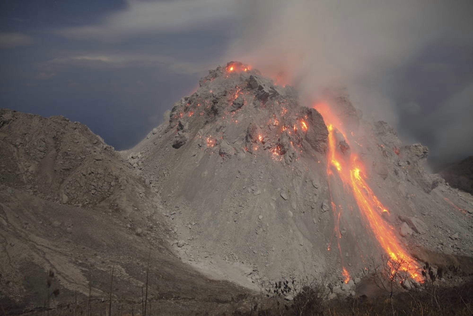 Incandescent rockfall at Rerombola lava dome of Paluweh volcano Canvas Art - Richard RoscoeStocktrek Images (35 x 23)