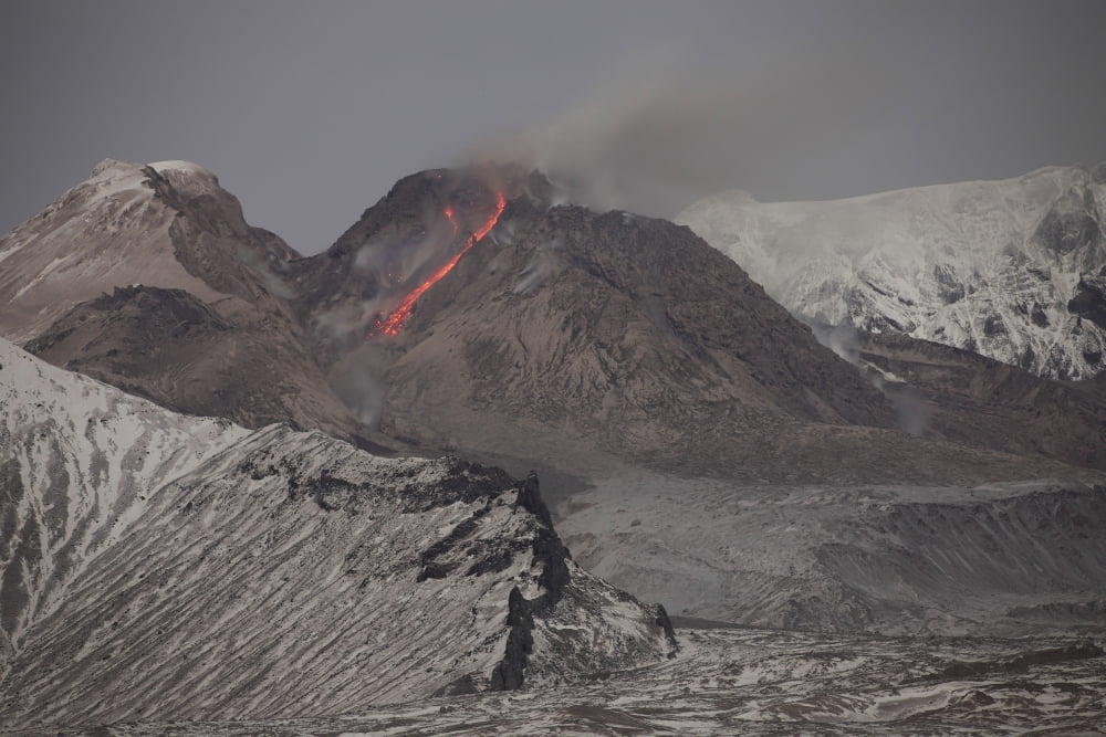 Incandescent rockfall of glowing lava down flank of Shiveluch Volcano Canvas Art - Richard RoscoeStocktrek Images (35 x 23)
