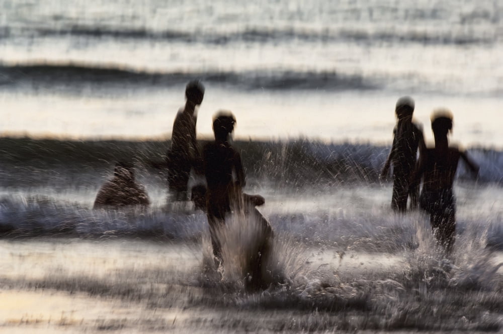 India Karnataka Blurry Figures In Crashing Waves At Gokarna Beach Gokarna Canvas Art - James Sparshatt Design Pics (19 x 12)