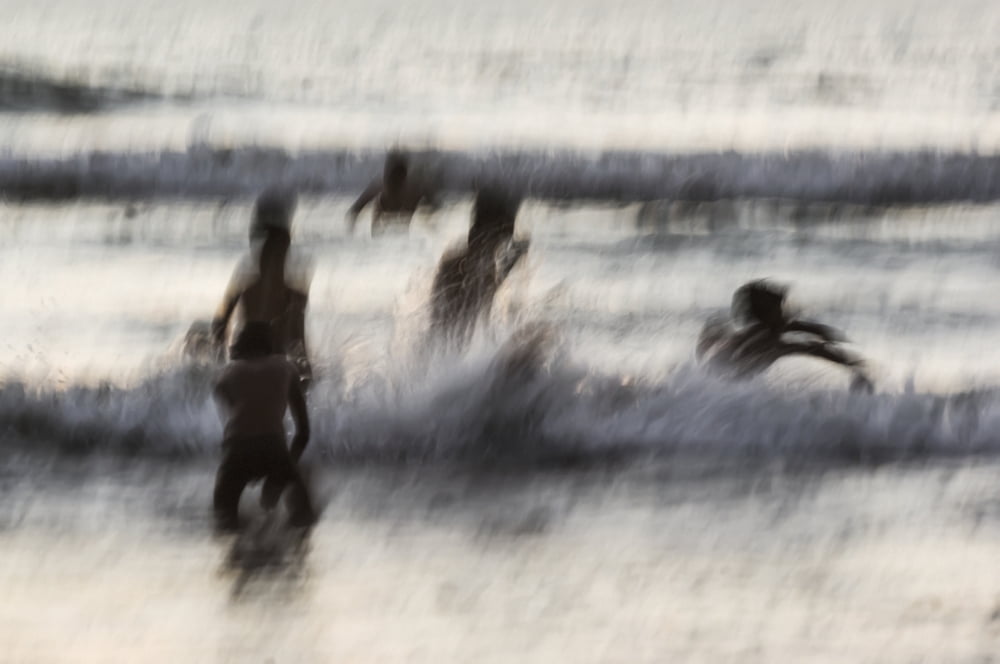 India Karnataka Blurry Figures In Crashing Waves At Gokarna Beach Gokarna Canvas Art - James Sparshatt Design Pics (38 x 24)