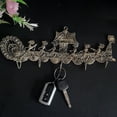thumbnail image 1 of India Meets India Brass Wall Hook [Golden], Decorative 5 Wall Hook Hanging Plate for Coats | Keys | Bags | Belts | Umbrella's | Hats, Collectible Item for Home Décor, 12 x 5 INCH, 1 of 4