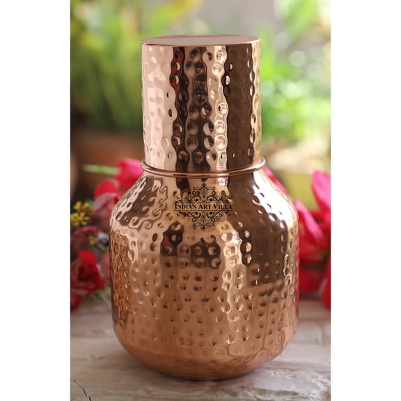Indian Art Villa Copper Hammered Shine Finish Ghada Shape bedroom bottle with Inbuilt Glass/Tumbler, Volume-52 Oz