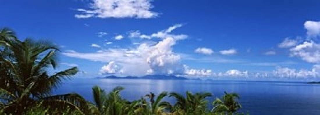 Indian ocean with palm trees towards Mahe Island looking from North Island Seychelles Canvas Art - Panoramic Images (18 x 7)