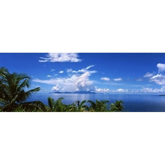 Indian ocean with palm trees towards Mahe Island looking from North Island, Seychelles Poster Print (18 x 7)