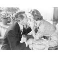thumbnail image 1 of Indiscreet Lady in Polka Dotted Dress with a Man Photo Print (24 x 30), 1 of 1