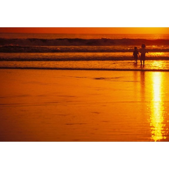 Indonesia Bali Kuta Beach At Sunset Children Play In Shoreline Orange Sky No Model Release Canvas Art - Dana Edmunds Design Pics (17 x 11)