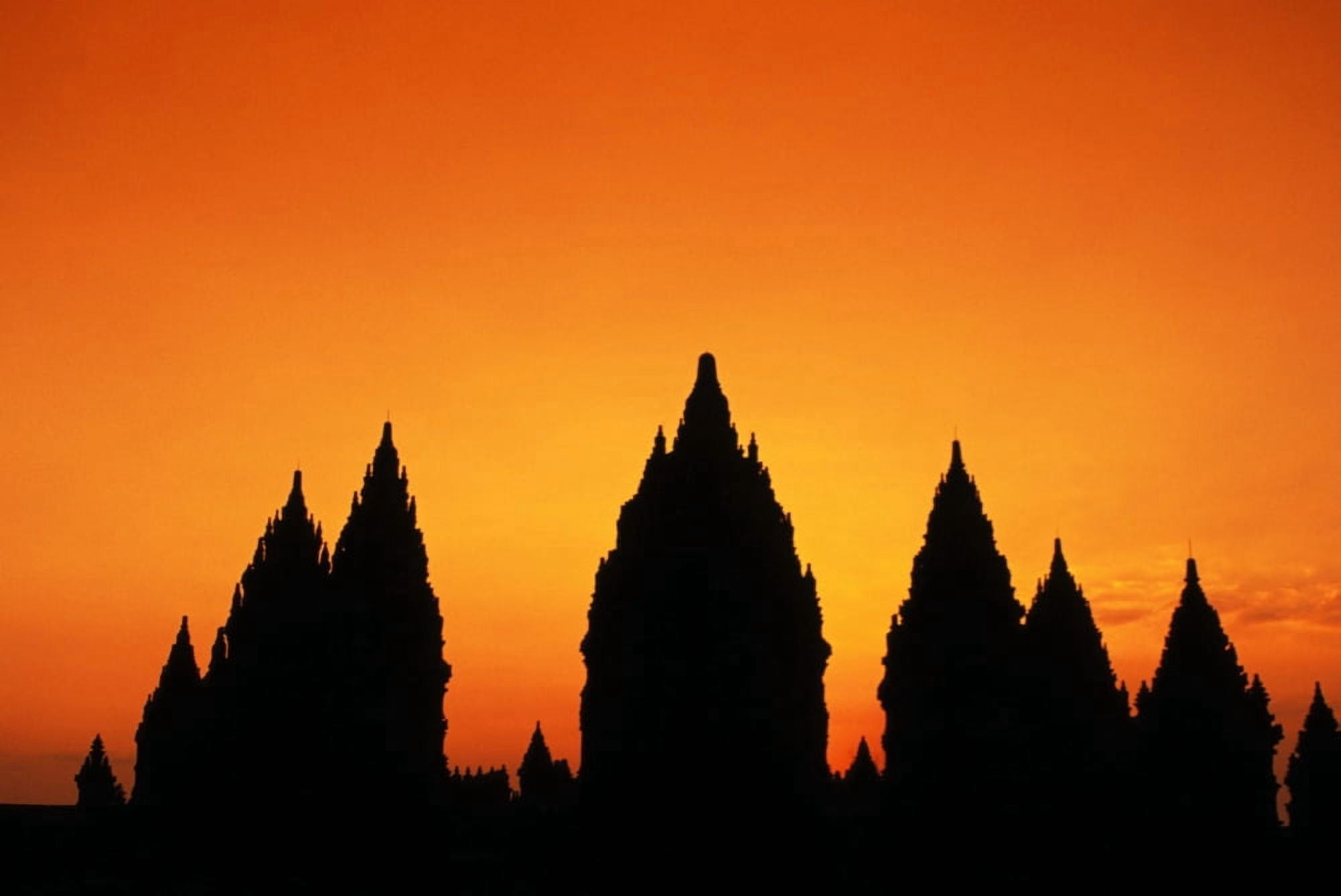 Indonesia Java Prambanan Shiva Mahadeva Temple Silhouetted At Sunset Canvas Art - Richard Maschmeyer Design Pics (17 x 11)