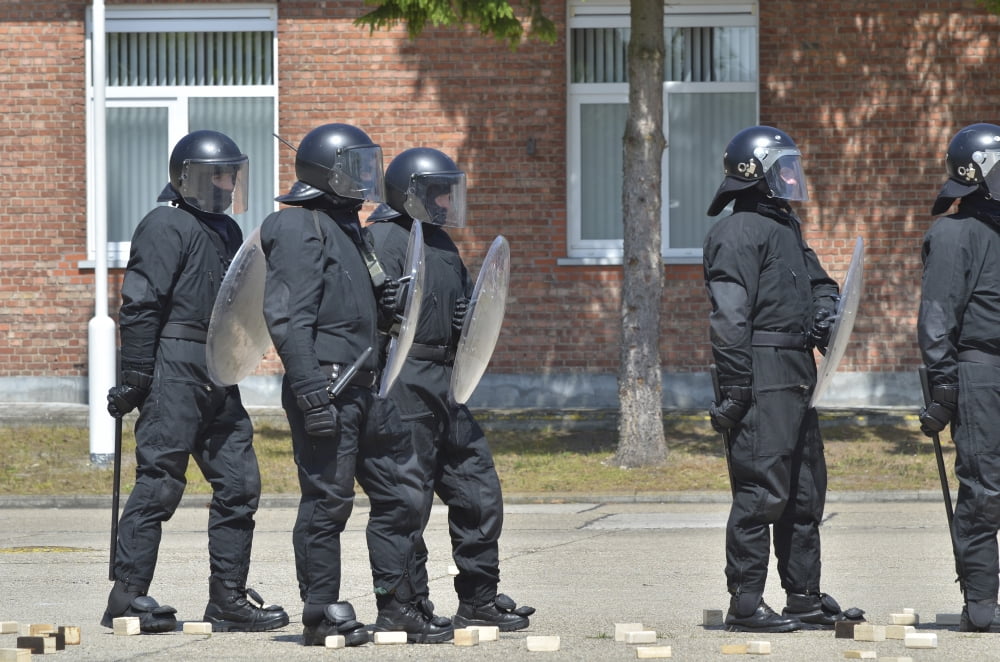 Infantry soldiers of the Belgian Army in riot gear during a training session in Leopoldsburg Belgium Canvas Art - Luc De JaegerStocktrek Images (35 x 23)
