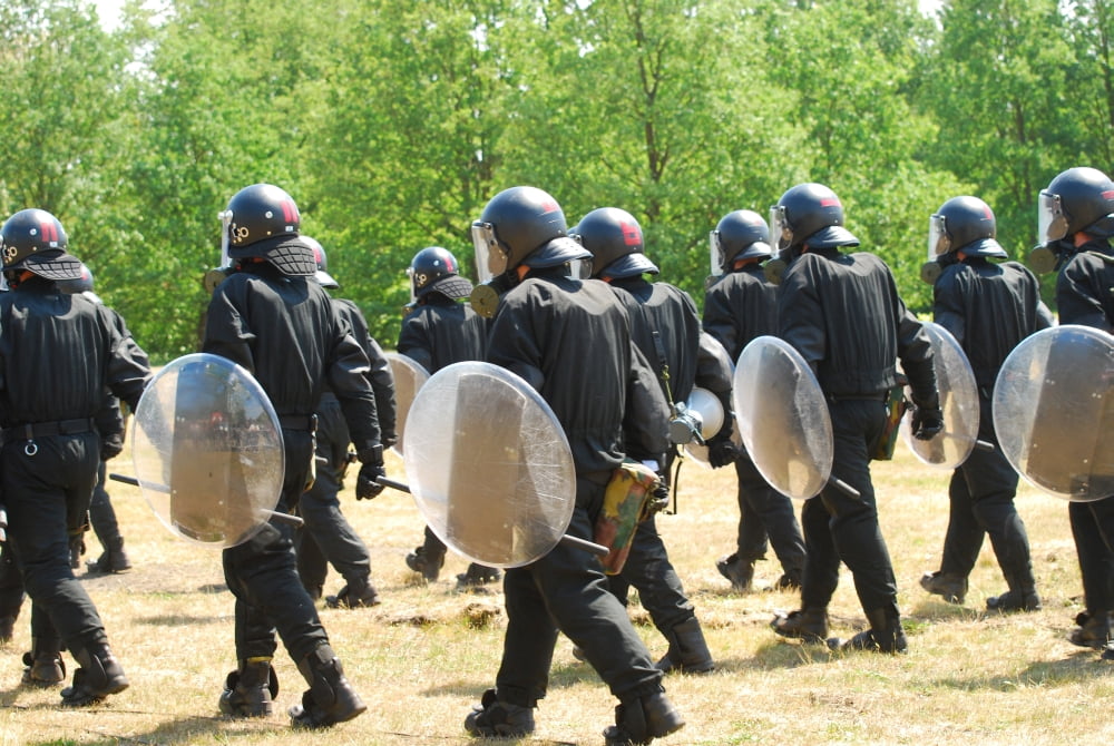 Infantry soldiers of the Belgian Army in full riot gear Canvas Art - Luc De JaegerStocktrek Images (34 x 23)