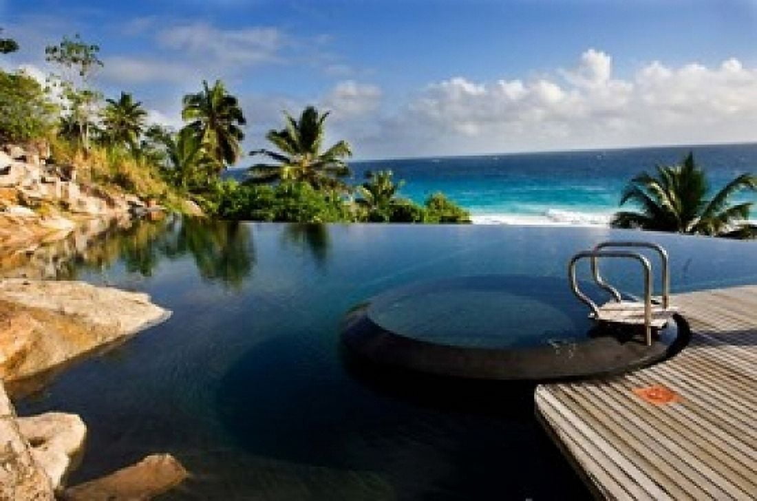 Infinity pool at resort on Fregate Island Seychelles Canvas Art - Alison Wright DanitaDelimont (17 x 11)