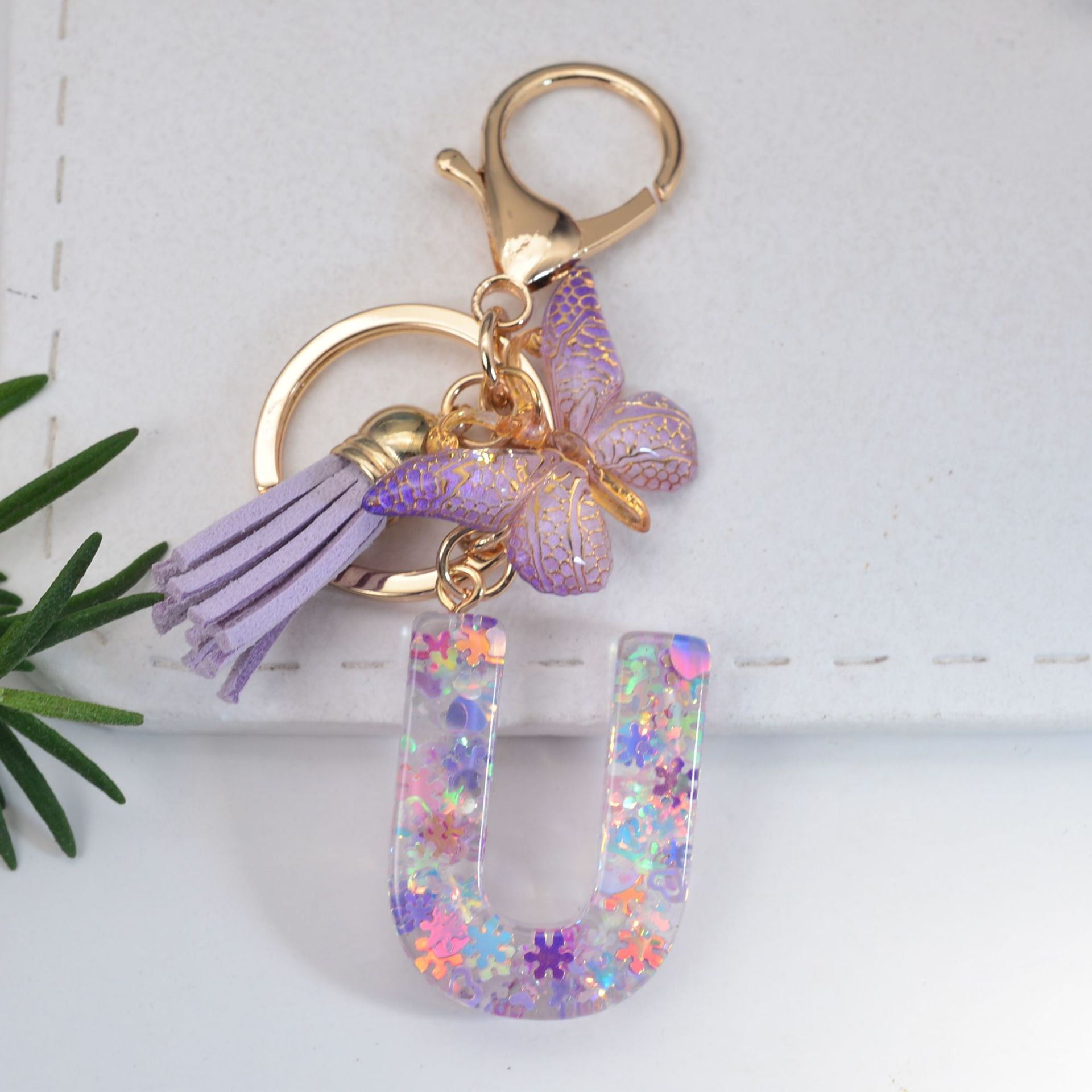 https://i5.walmartimages.com/seo/Initial-Letter-Keychains-for-Girls-Women-Pink-Purple-Green-Cute-Butterfly-Heart-Keychain-for-Backpack-School-Bag_658d0b42-4855-44c2-aa08-9f58d2f44f32.4335afe7562354332e271cd6ee45b063.jpeg