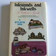 thumbnail image 1 of Pre-Owned Inkstands and Inkwells A Collector's Guide: A Comprehensive Survey of Writing Paraphernalia from the 17th to the 20th Century (Hardcover) 0517504197 9780517504192, 1 of 1