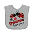 thumbnail image 1 of Inktastic My Grandma Loves Me with Cute Ladybugs Boys or Girls Baby Bib, 1 of 4
