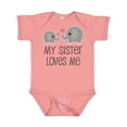 thumbnail image 1 of Inktastic My Sister Loves Me Boys or Girls Baby Bodysuit, 1 of 5