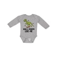 thumbnail image 1 of Inktastic Nana and Grandpa Love Me Dinosaur Grandson Boys Long Sleeve Baby Bodysuit, 1 of 5