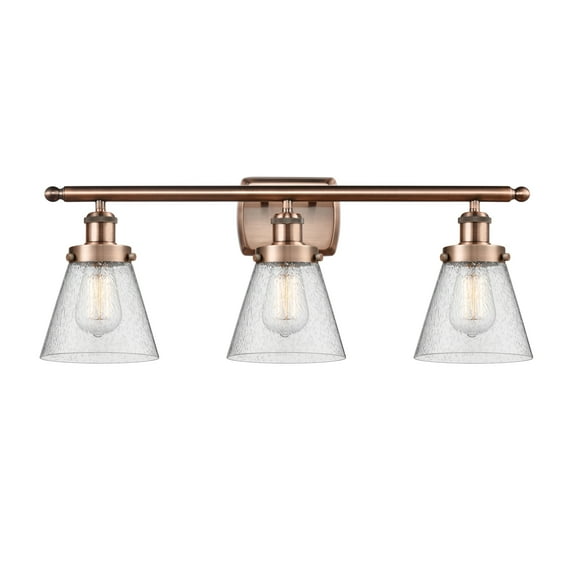 Innovations Lighting Ballston Urban Cone - 3 Light 26" Bath Vanity Light Antique Copper Finish/Seedy