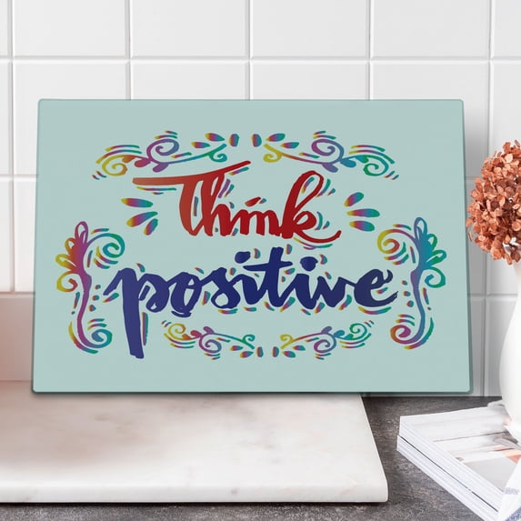 Inspirational Cutting Board, Think Positive Calligraphic Art Floral Swirls Optimistic Life Words, Decorative Tempered Glass Cutting and Serving Board, Large Size, Multicolor, by Ambesonne