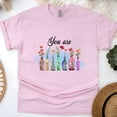 thumbnail image 1 of Inspirational Graphic T-Shirt with Colorful Bottles and Uplifting Words, Light Pink, Size S, 1 of 6