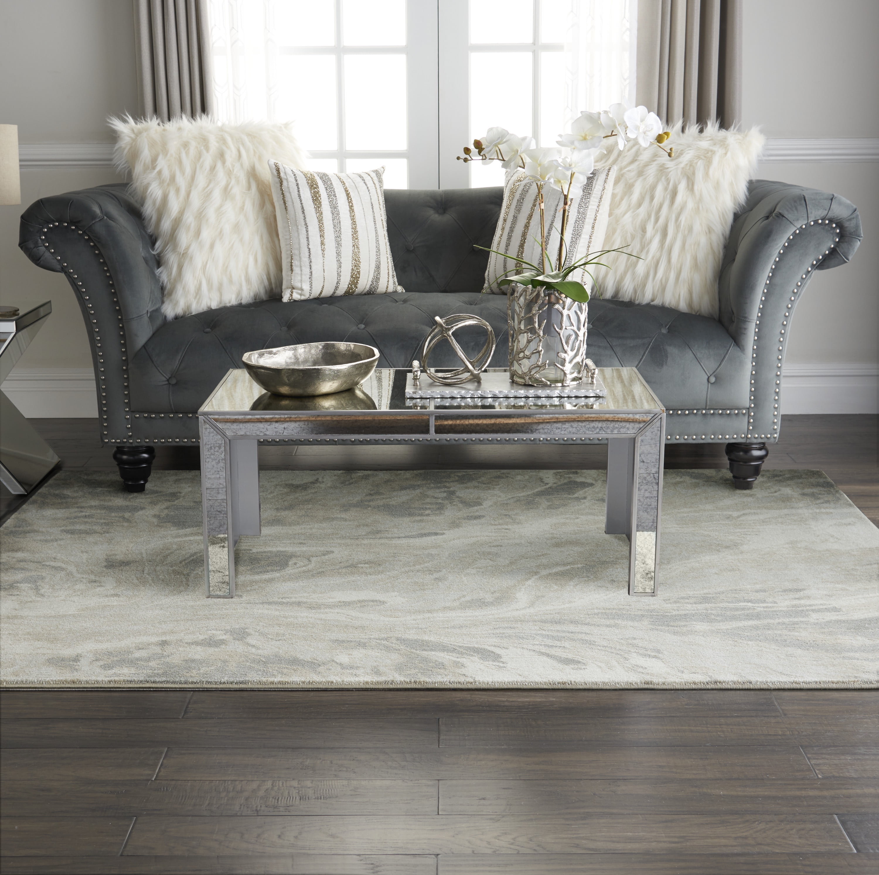 Cosmopolitan Chic Abstract Grey Synthetic 5'3" x 7'3" Round Rug
