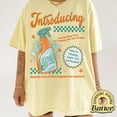 thumbnail image 1 of Inspired Pop Culture T-Shirt, Retro Ad Style Graphic Tee, Gift for Fan, 1 of 5