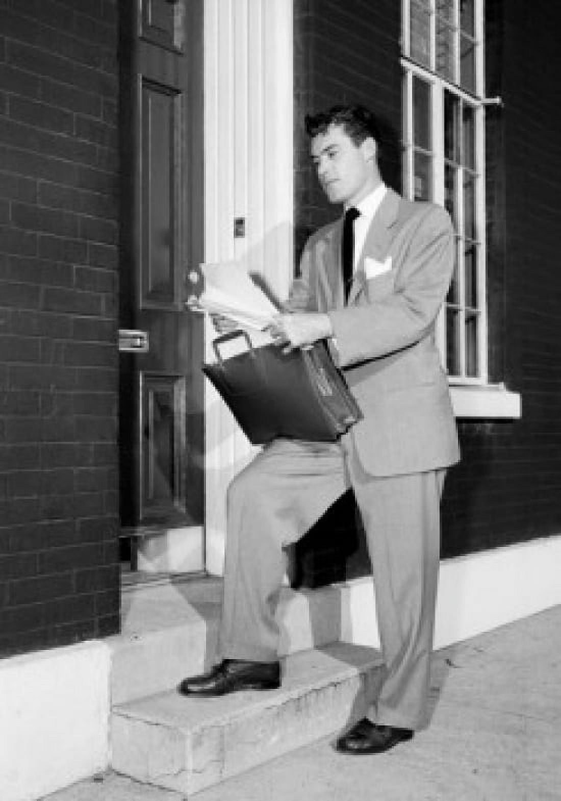 Insurance agent at front door holding documents Canvas Art - (18 x 24)