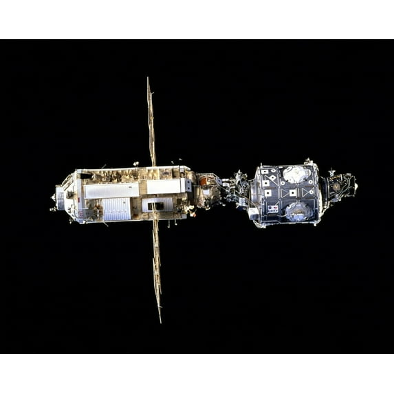 International Space Station In 1998. The Russian Made Zarya (Left) Docked With The Us Made Unity Module Form The First Phase Of The International Space Station. Zarya Was Launched On A Russian Rocket