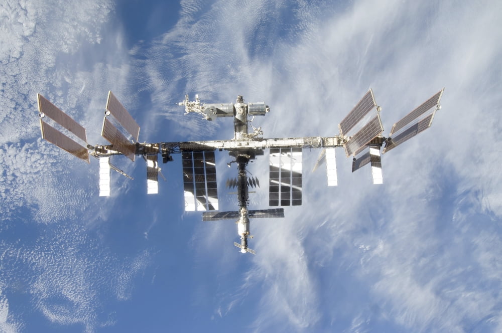 International Space Station backdropped against Earth Canvas Art - Stocktrek Images (35 x 23)