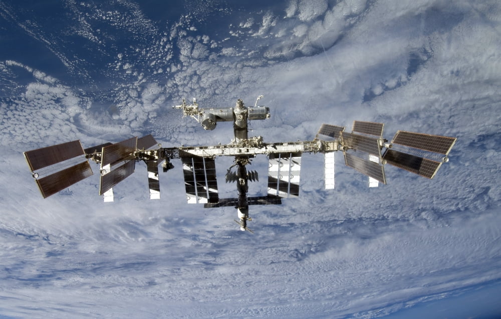 International Space Station backdropped against Earth Canvas Art - Stocktrek Images (35 x 23)