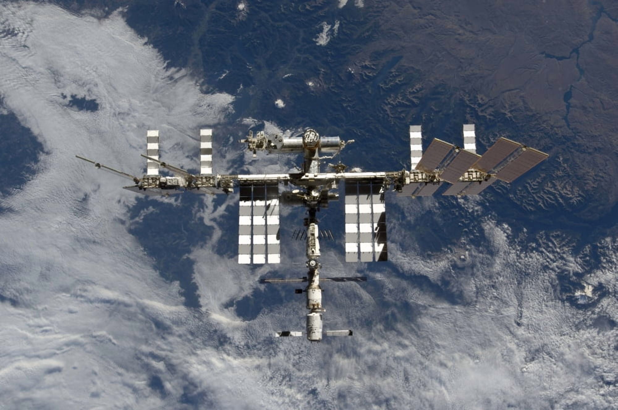 International Space Station backgropped by a blue and white Earth Canvas Art - Stocktrek Images (35 x 23)
