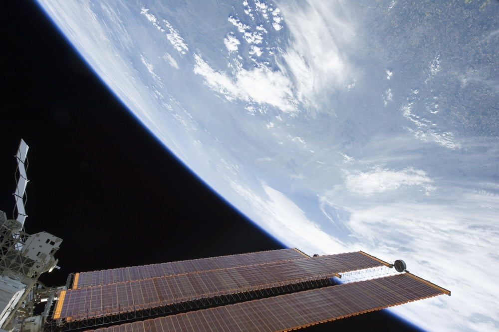 International Space Station solar array panels and planet Earth Canvas Art - Stocktrek Images (34 x 23)