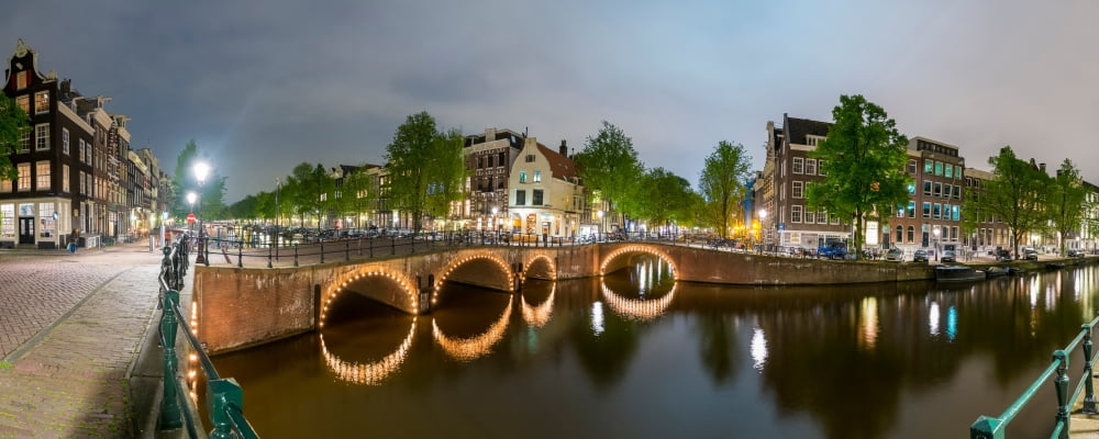 Intersection of Keizersgracht and Leliegracht at night Amsterdam North Holland Netherlands Canvas Art - Panoramic Images (36 x 12)