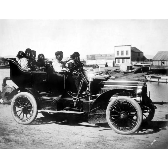 Inuits In Car C1906. Na Group Of Inuits Riding In A Car. Photograph By Frank Nowell C1906. Poster Print by