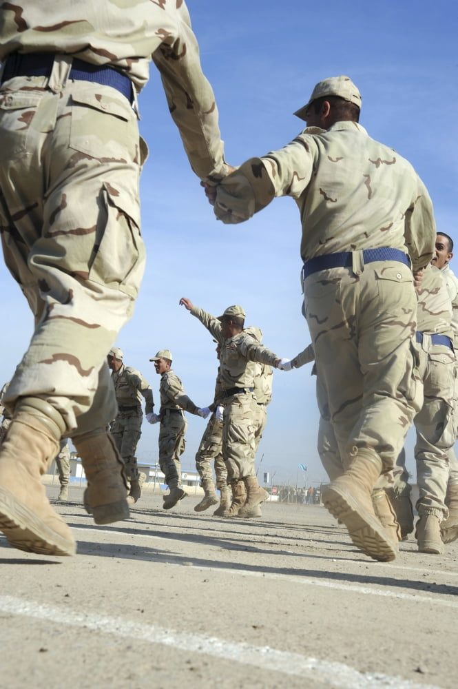 Iraqi Air Force recruits celebrate with singing and dancing Canvas Art - Stocktrek Images (23 x 35)