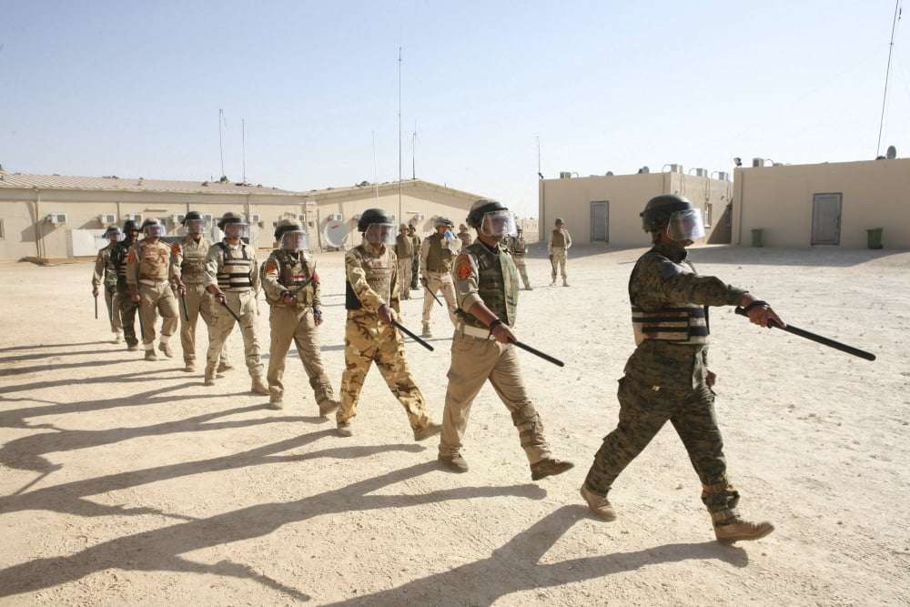 Iraqi Army soldiers march into formation during a riot control training exercise Canvas Art - Stocktrek Images (34 x 23)