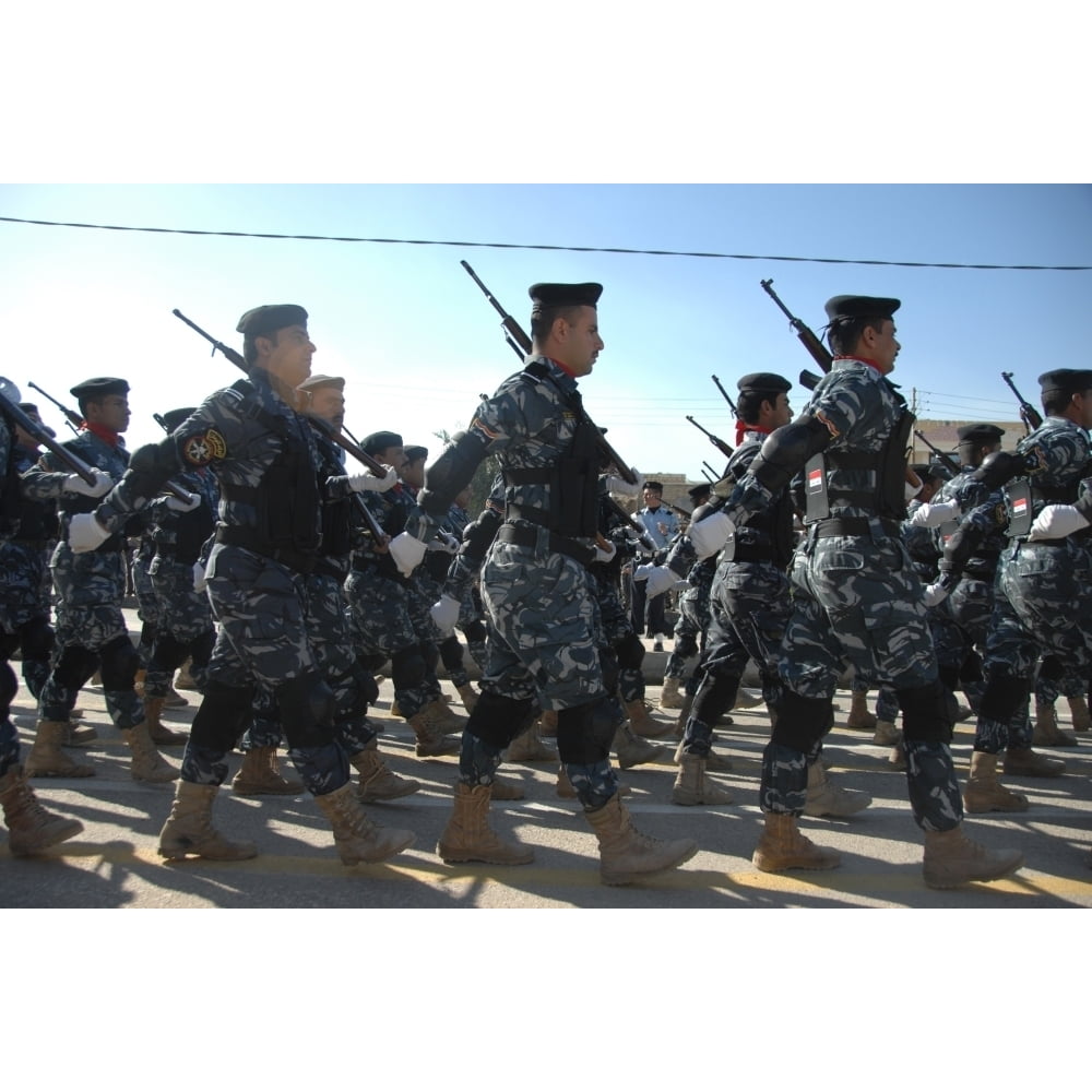 Iraqi Police Officers March During A Parade In Their Honor Near The In Nasiriyah Iraq. Jan. 9 2010.