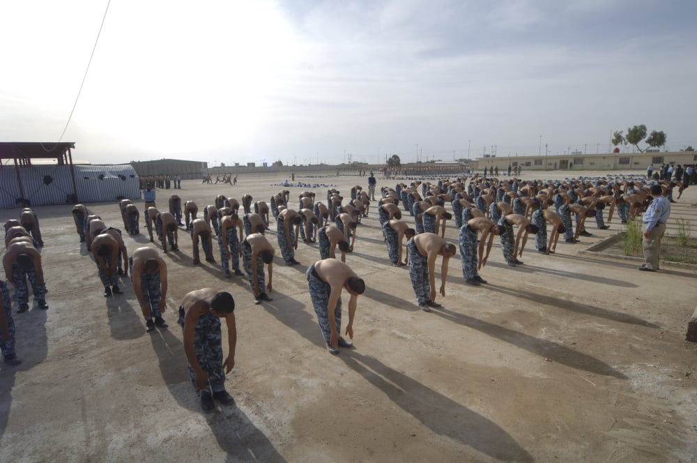 Iraqi police cadets being trained by the British Army and police Canvas Art - Andrew ChittockStocktrek Images (17 x 12)