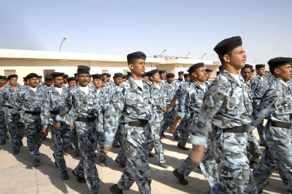 Iraqi police cadets being trained by the British Army and police Canvas Art - Andrew ChittockStocktrek Images (17 x 12)