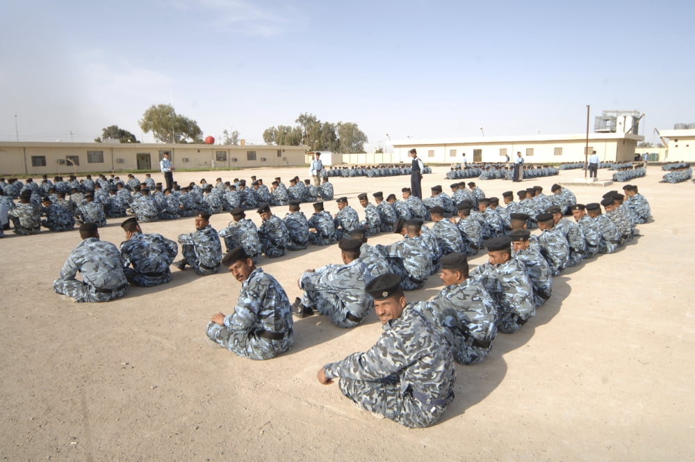 Iraqi police cadets being trained by the British Army and police Canvas Art - Andrew ChittockStocktrek Images (17 x 12)
