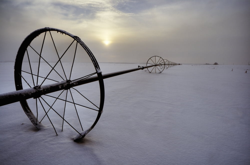 Irrigation Equipment Resting In The Snow Alberta Canvas Art - Dan Jurak Design Pics (17 x 11)