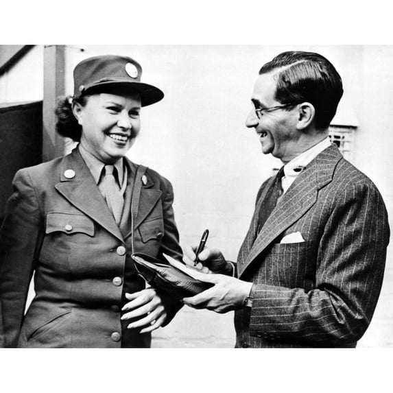 Irving Berlin Gives Autograph To Sybile Kinsey After His Arrival For Rehearsals Of 'This Is The Army' At The Palladium