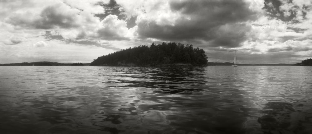 Island in the Pacific Ocean against cloudy sky San Juan Islands Washington State USA Canvas Art - Panoramic Images (6 x 15)
