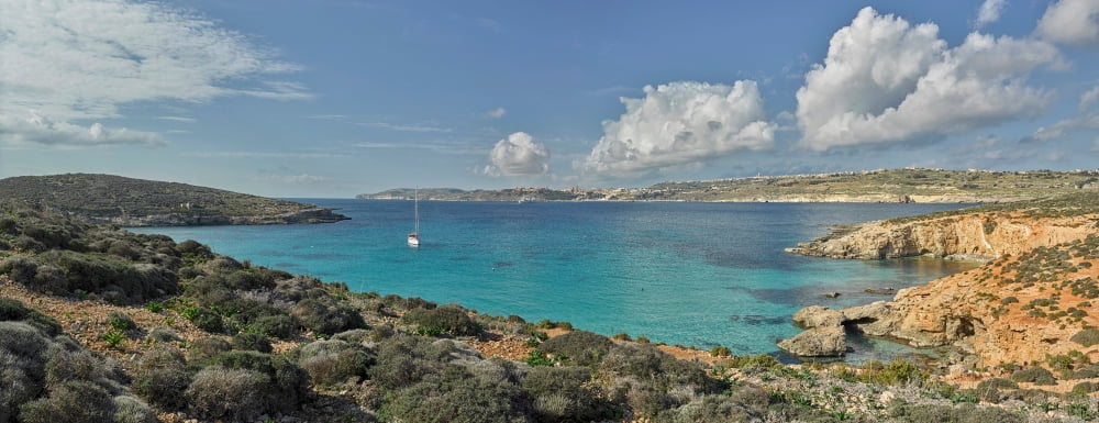 Islands in the sea Blue Lagoon Comino Gozo Malta Canvas Art - Panoramic Images (6 x 15)