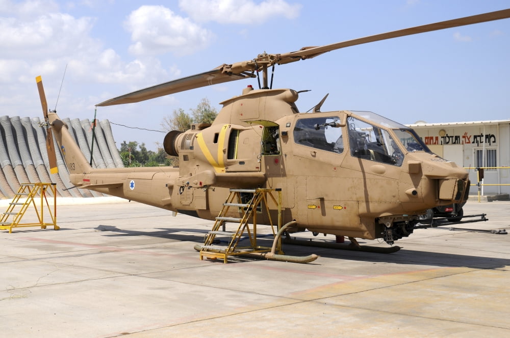 Israeli Air Force AH-1 Tzefa attack helicopter at Tel Nof Air Base Israel Canvas Art - Riccardo NiccoliStocktrek Images (34 x 23)
